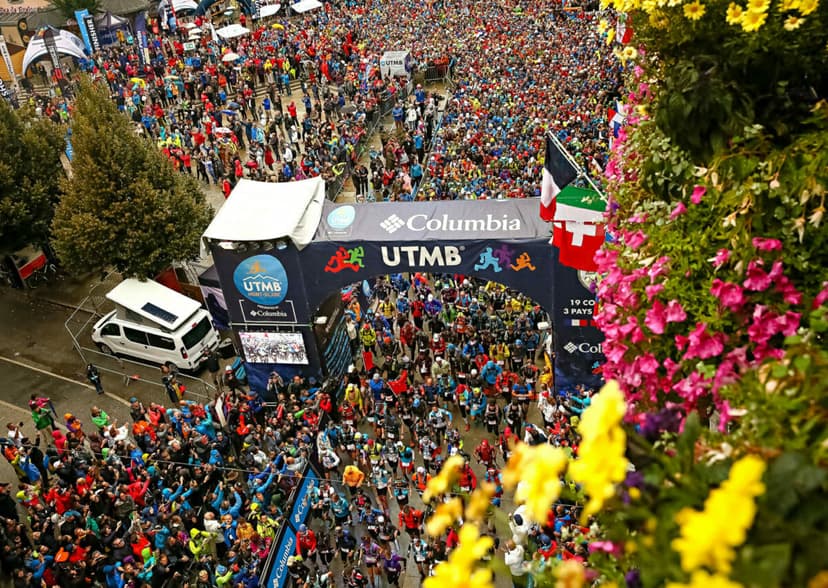 the start of UTMB as seen from above, with thousand of runners leaving Chamonix, France.