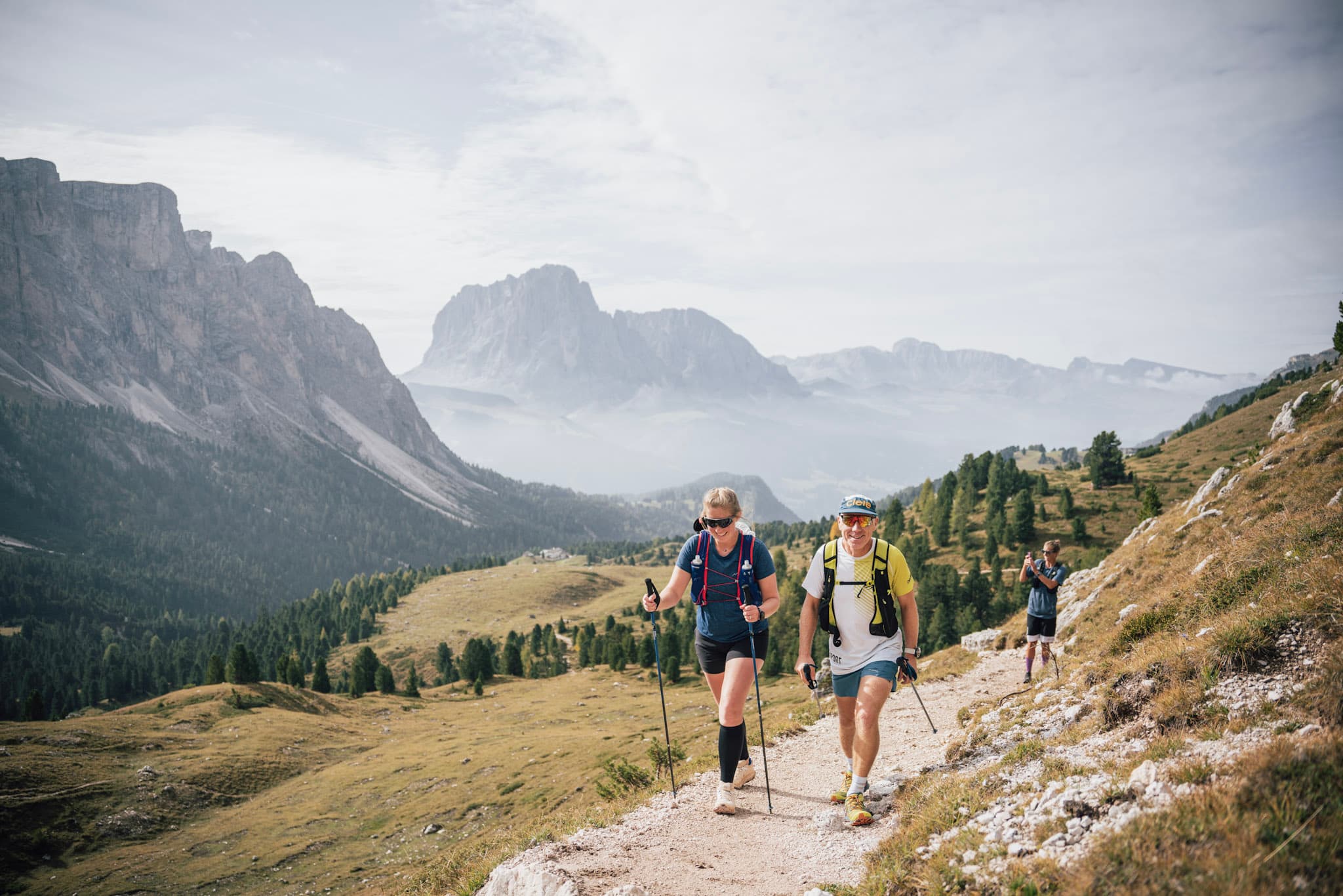 using poles on a trail in the Dolomites