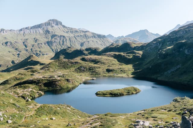 landscape of lake with island in the middle