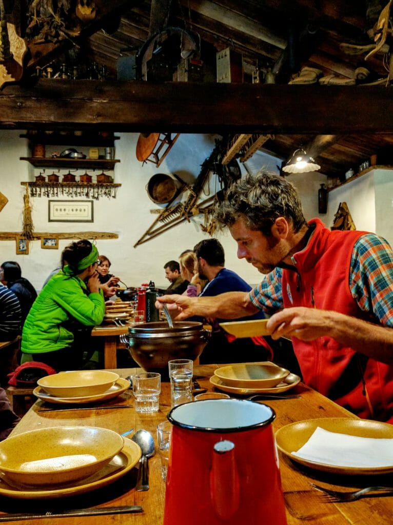 Run the Alps Guide Alister Bignell serves up the first course at Les Mottets, on the Tour du Mont-Blanc.