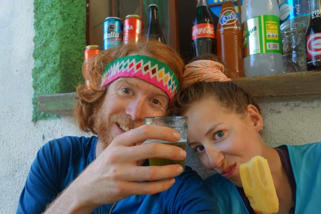 Grant Fulton with a beer and his girlfriend with an icecream