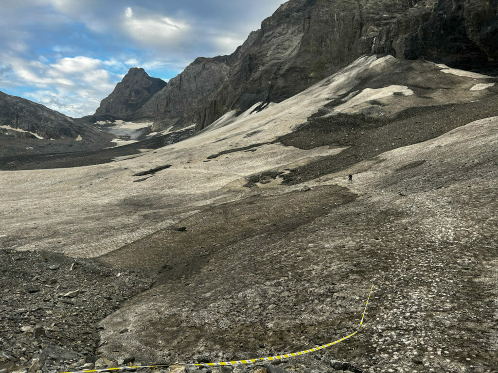 Doug descending from Hohturli pass at sunset