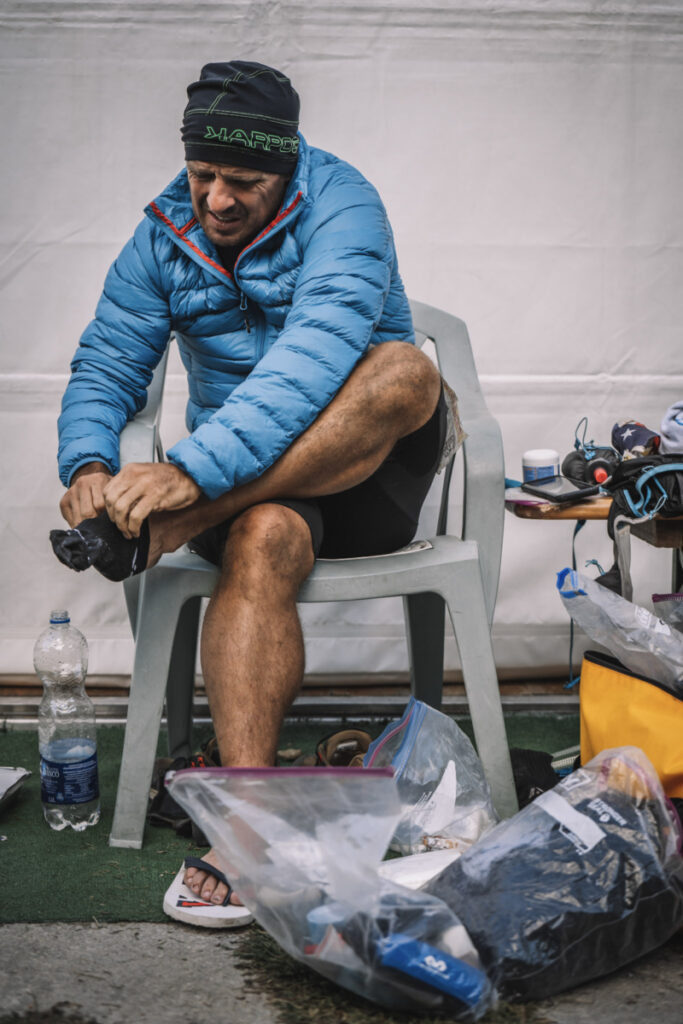 Tor des Geants runner changing socks