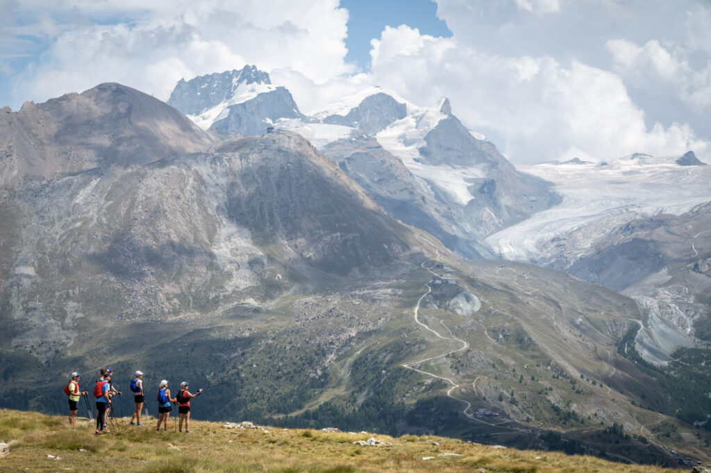 group of runners looking at view Zermatt