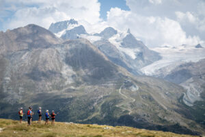 group of runners looking at view Zermatt