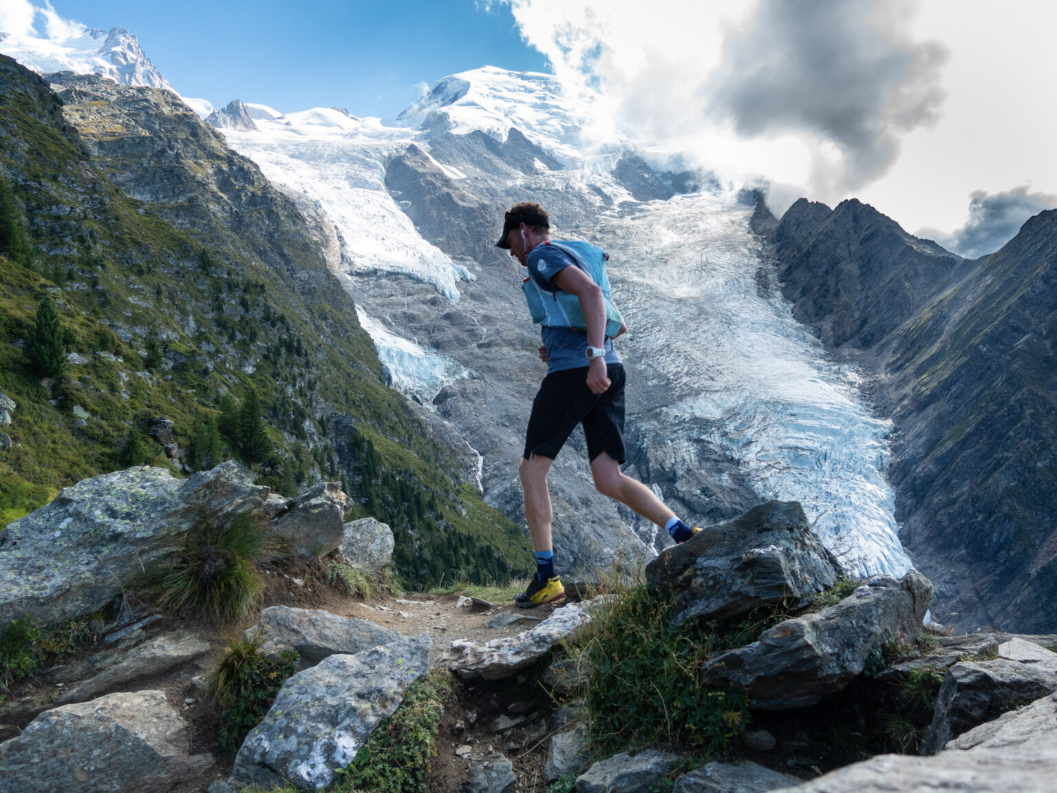 Runner with huge glacier in background