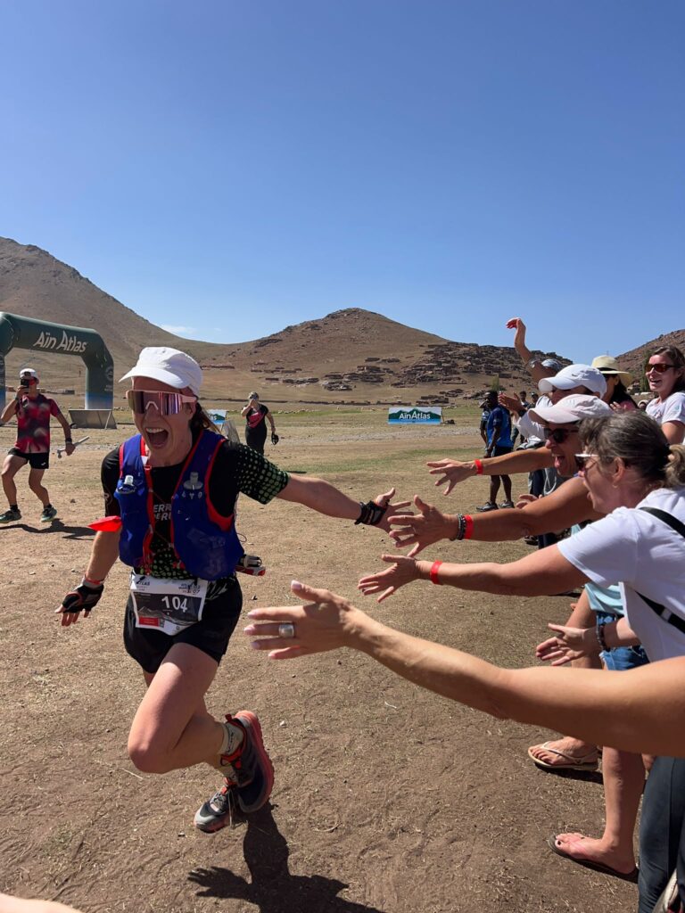 Run the Alps guide Astrid Renet running in a trail race in Morocco