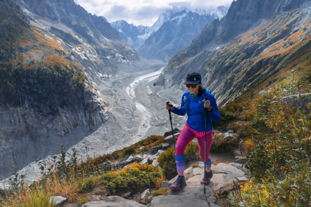 woman in pink tights above Mer de Glace