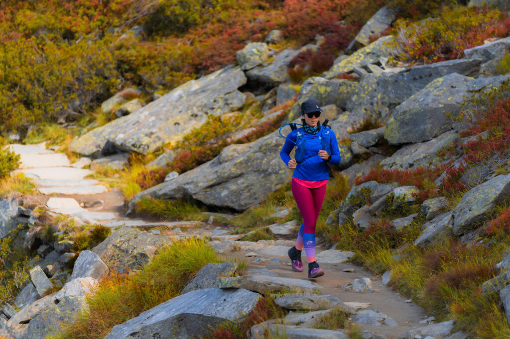 woman in pink tights on Chamonix's Balcony Nord trail