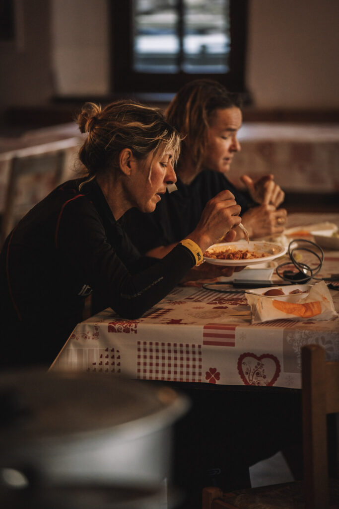 two women eating pasta during Tor