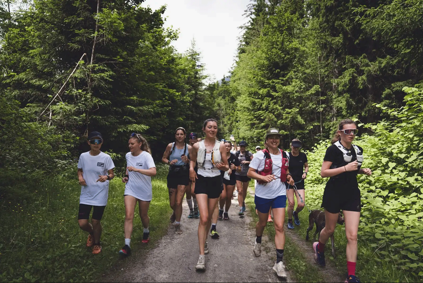 ladies running on wide trail